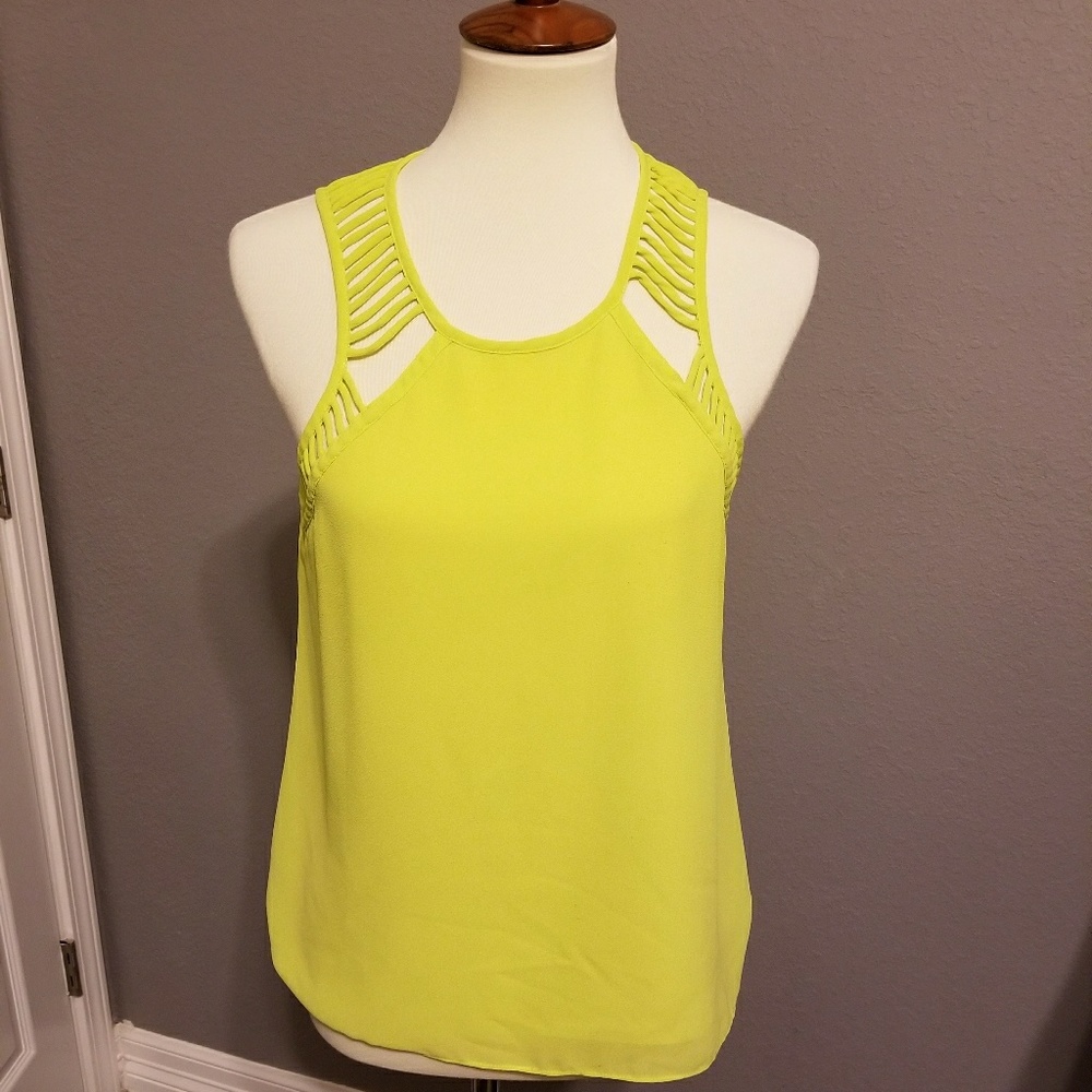 Bright neon sleeveless blouse.